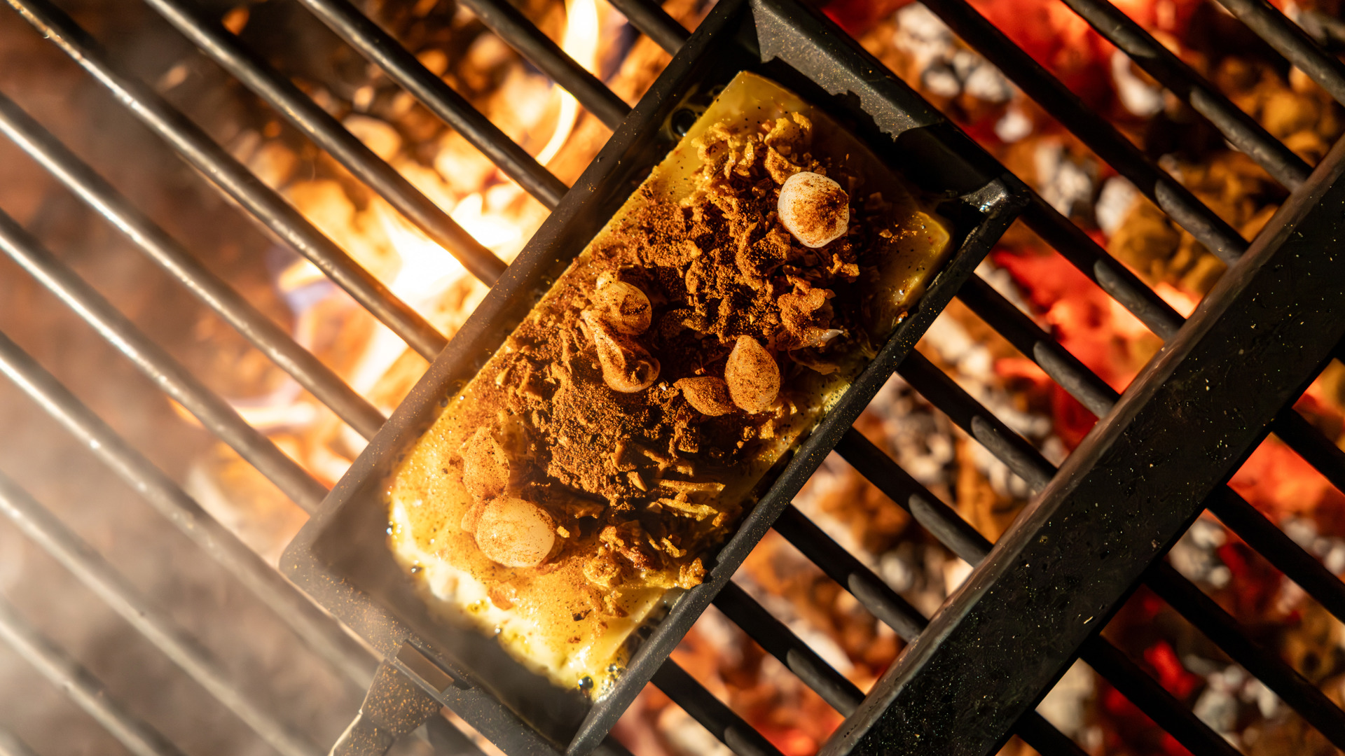 Raclette über dem Feuer