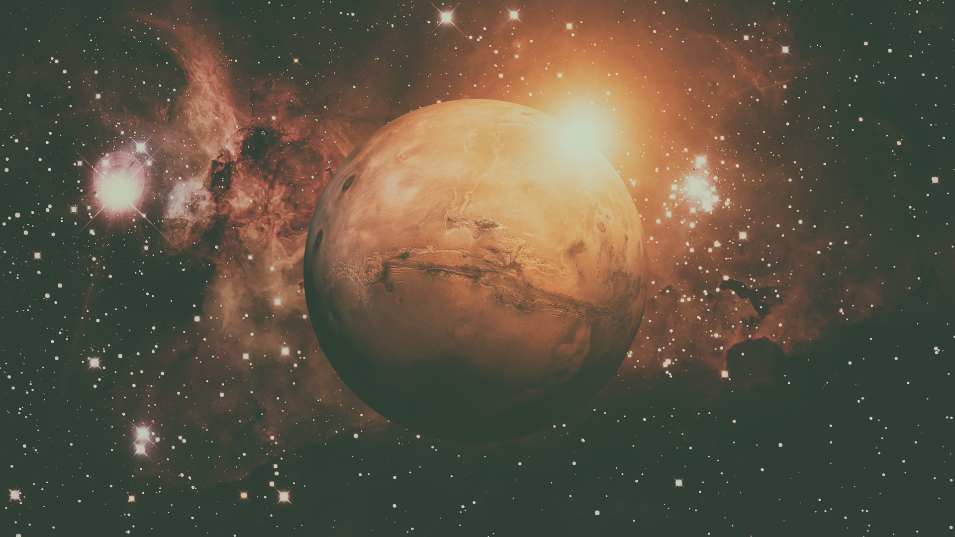 Eine Teleskopaufnahme des Mond bei Nacht. Die Sterne neben dem Mond sind sehr gut zu sehen.